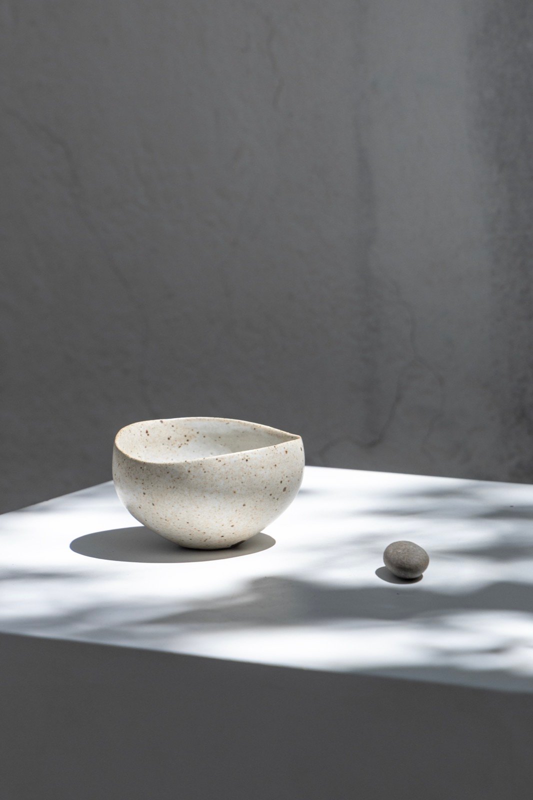 Small bowl and stone