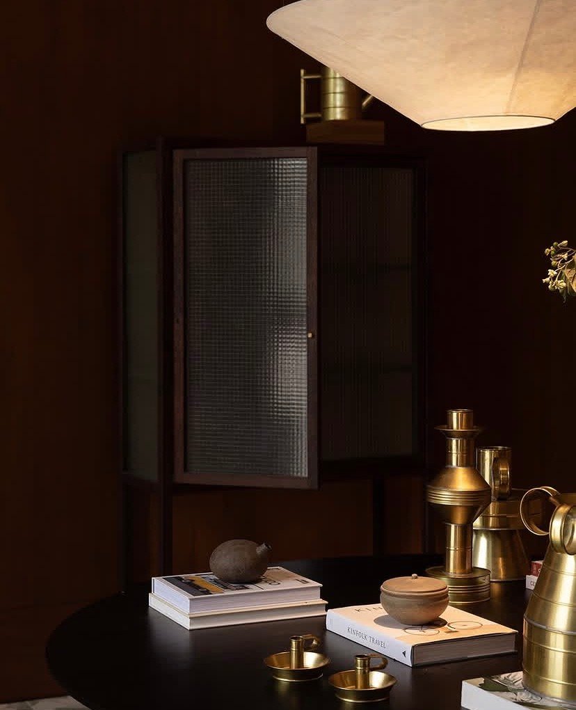 Dark cabinet with vessels